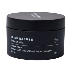 Blind Barber front jar showing product branding and compact design benefit