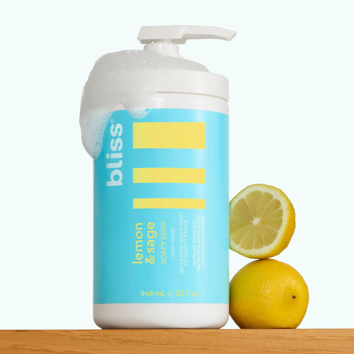 Bliss bottle next to common objects showing 32 fl oz size and fewer refills benefit