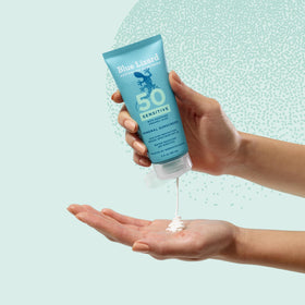 Blue Lizard reef-friendly icon and packaging emphasizing ocean-safe formulation
