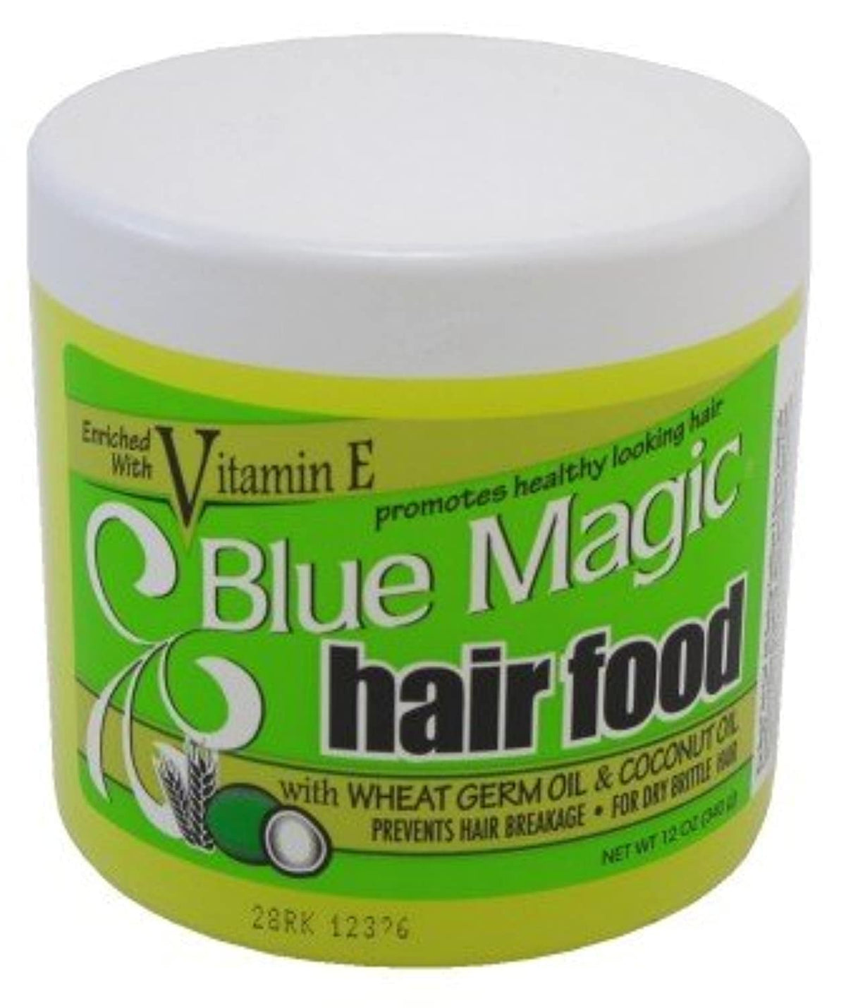 Applying Blue Magic to hair ends with hands for smoother styling