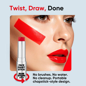 Blue Squid stick held in hand showing scale and portable convenience for touch-ups