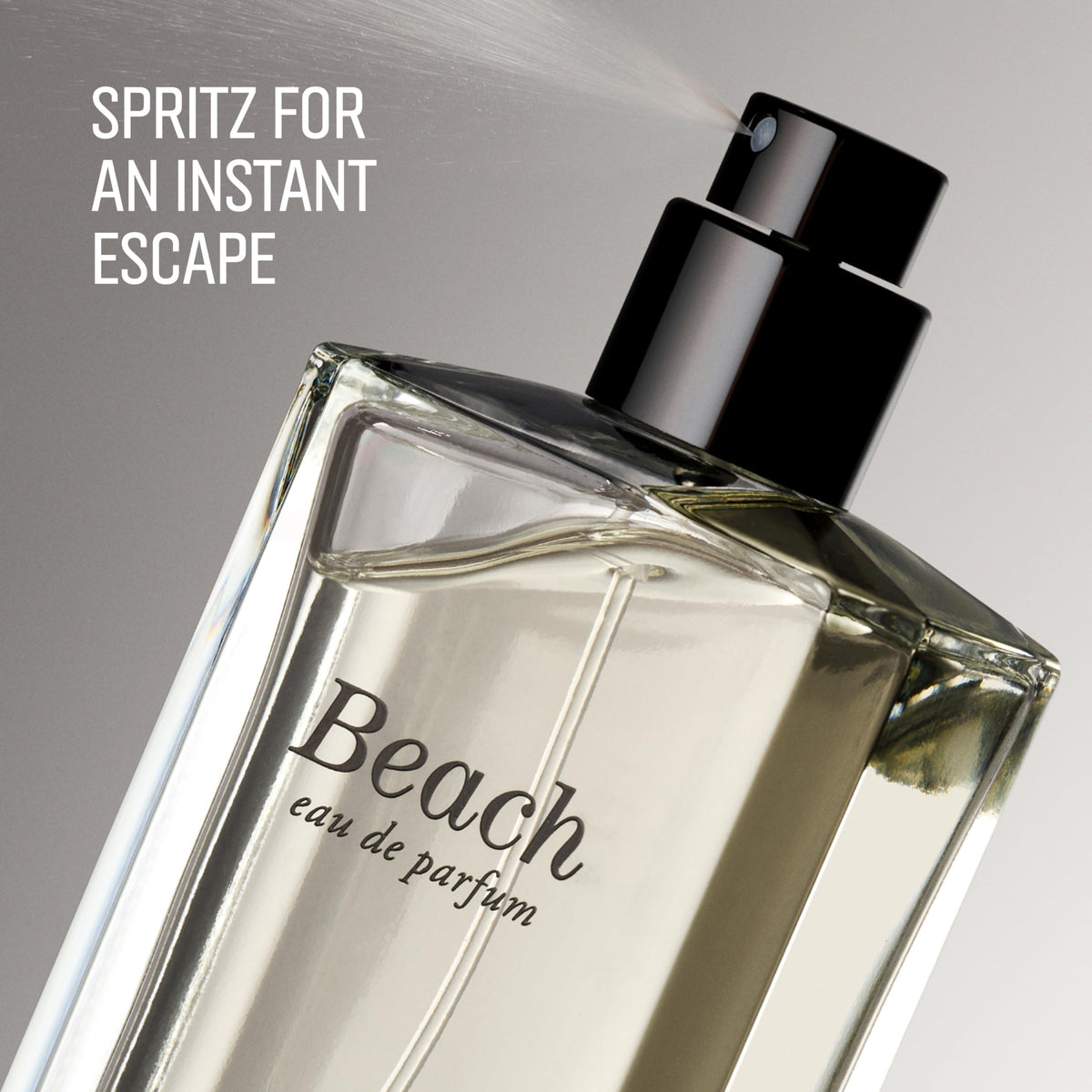 Bobbi Brown bottle on sand with ocean background suggesting fresh beach atmosphere