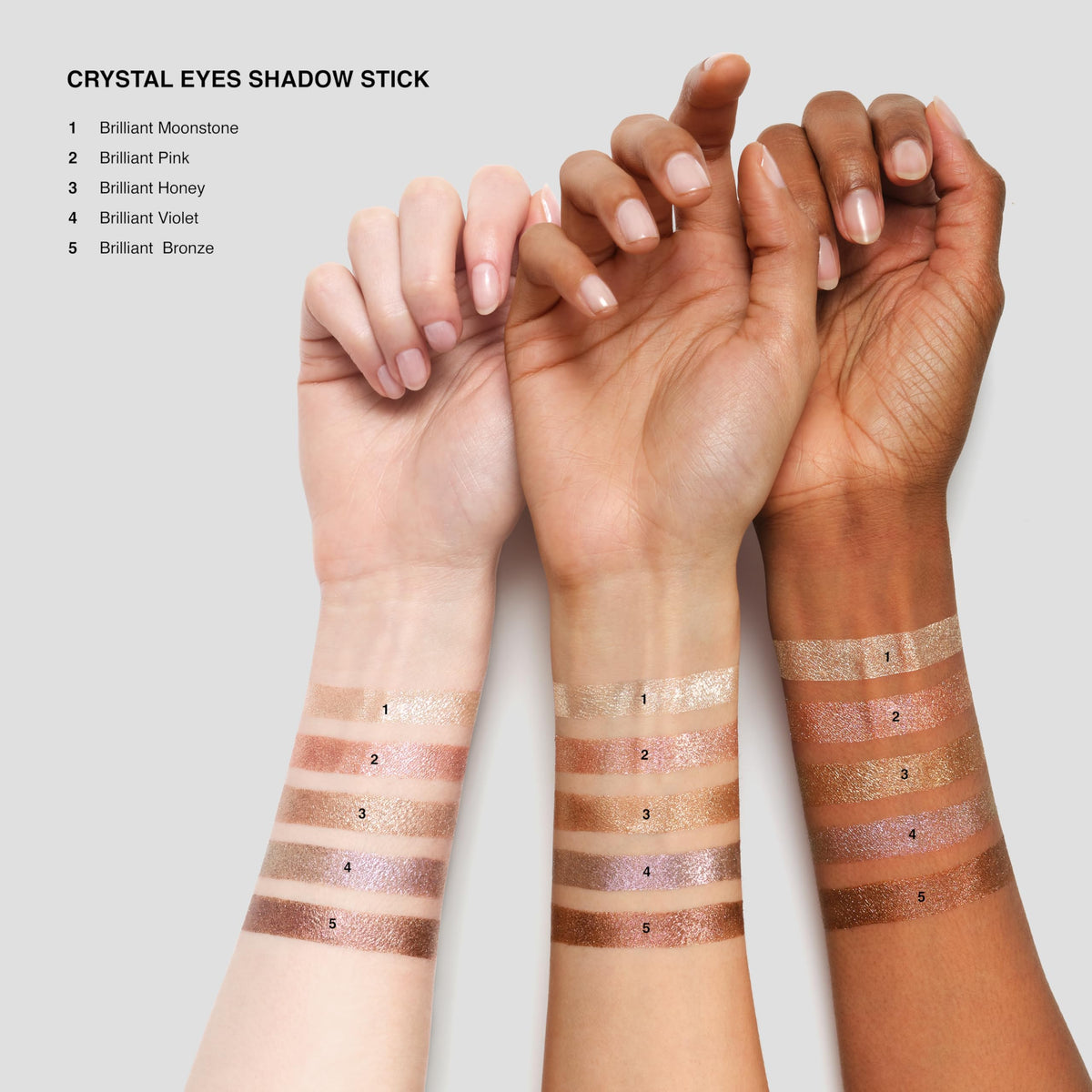 Bobbi Brown Crystal Eyes next to coin for scale showing compact travel-friendly size