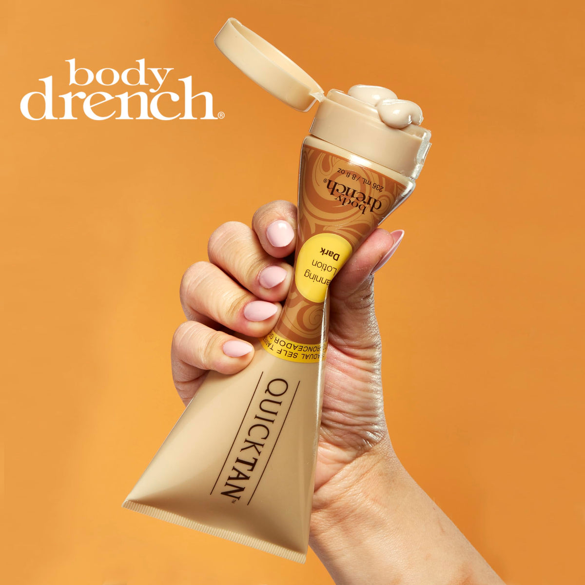 Body Drench next to hand for scale emphasizing travel-friendly 8 fl oz size