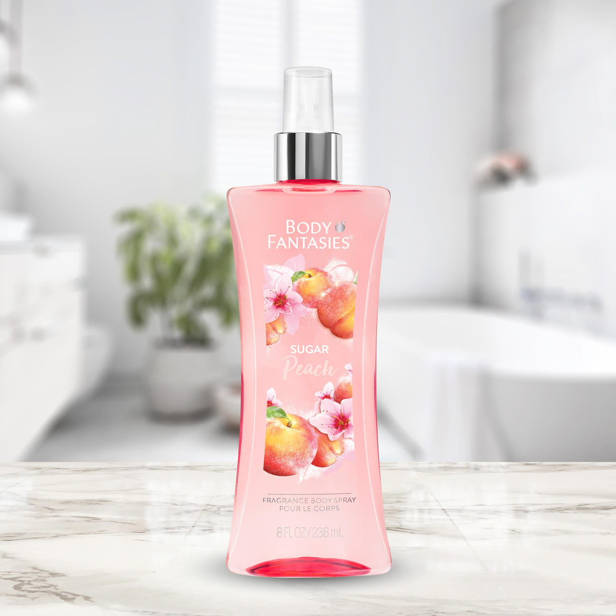 Body Fantasies bottle staged in sunny orchard setting conveying fruity freshness