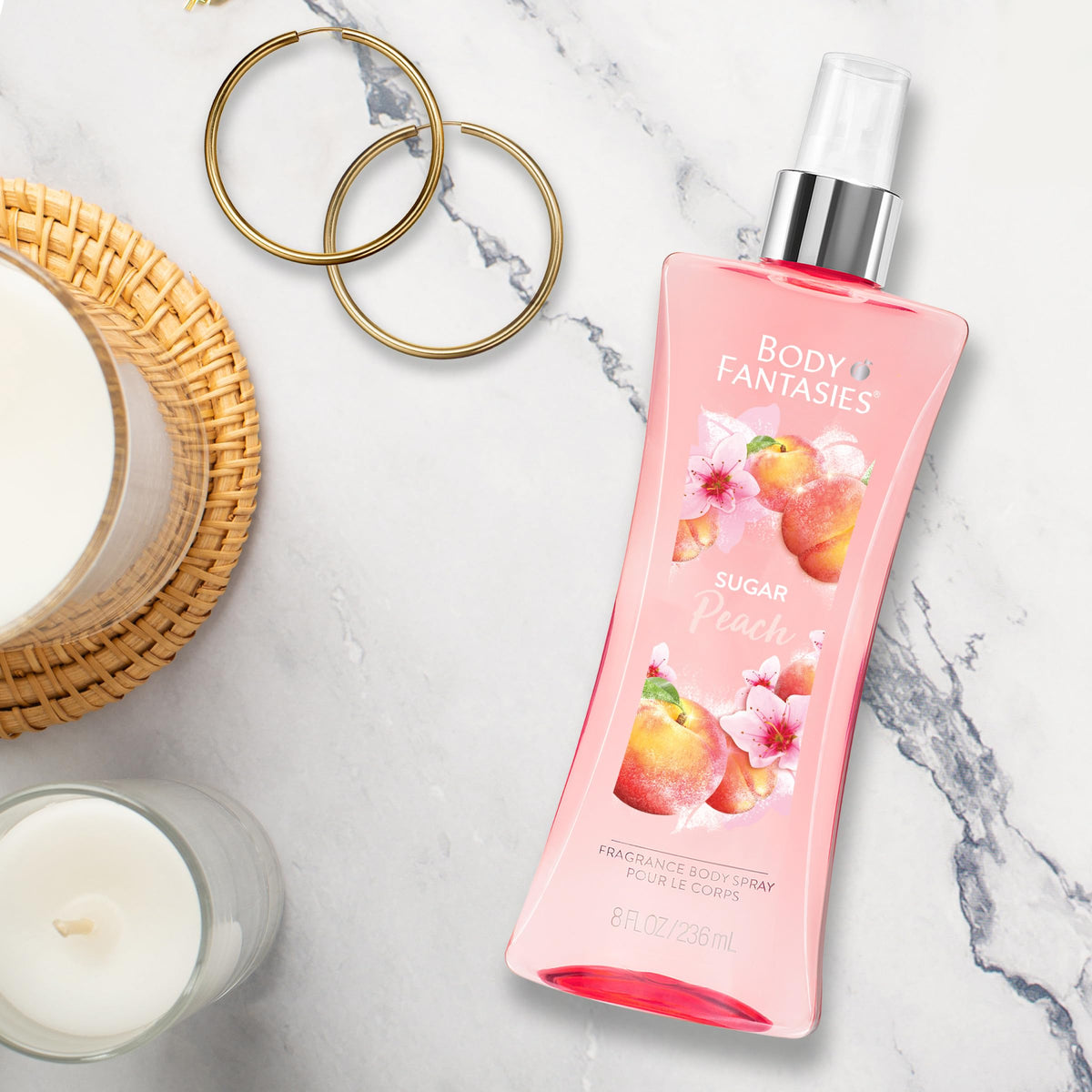 Body Fantasies bottle in hand showing 8 fl oz scale for travel convenience