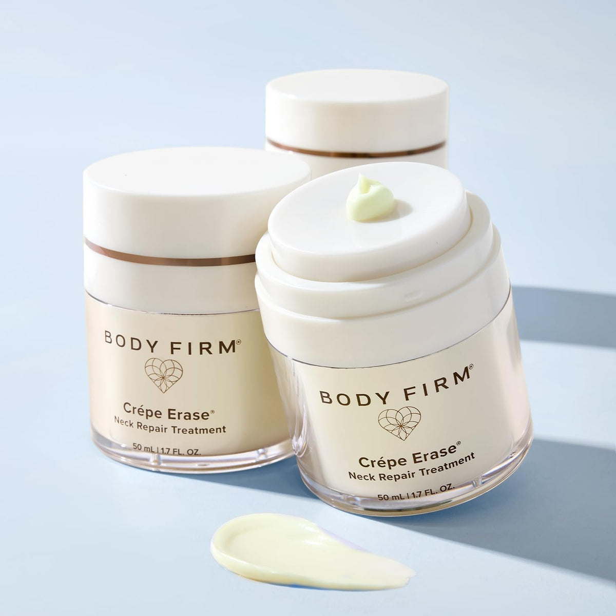 BODY FIRM packaging label close-up showing ingredient callouts and product name