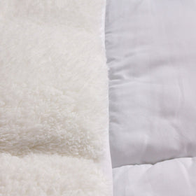 Body Linen pad beside ruler for size scale confirming fit up to 34 by 76 inches