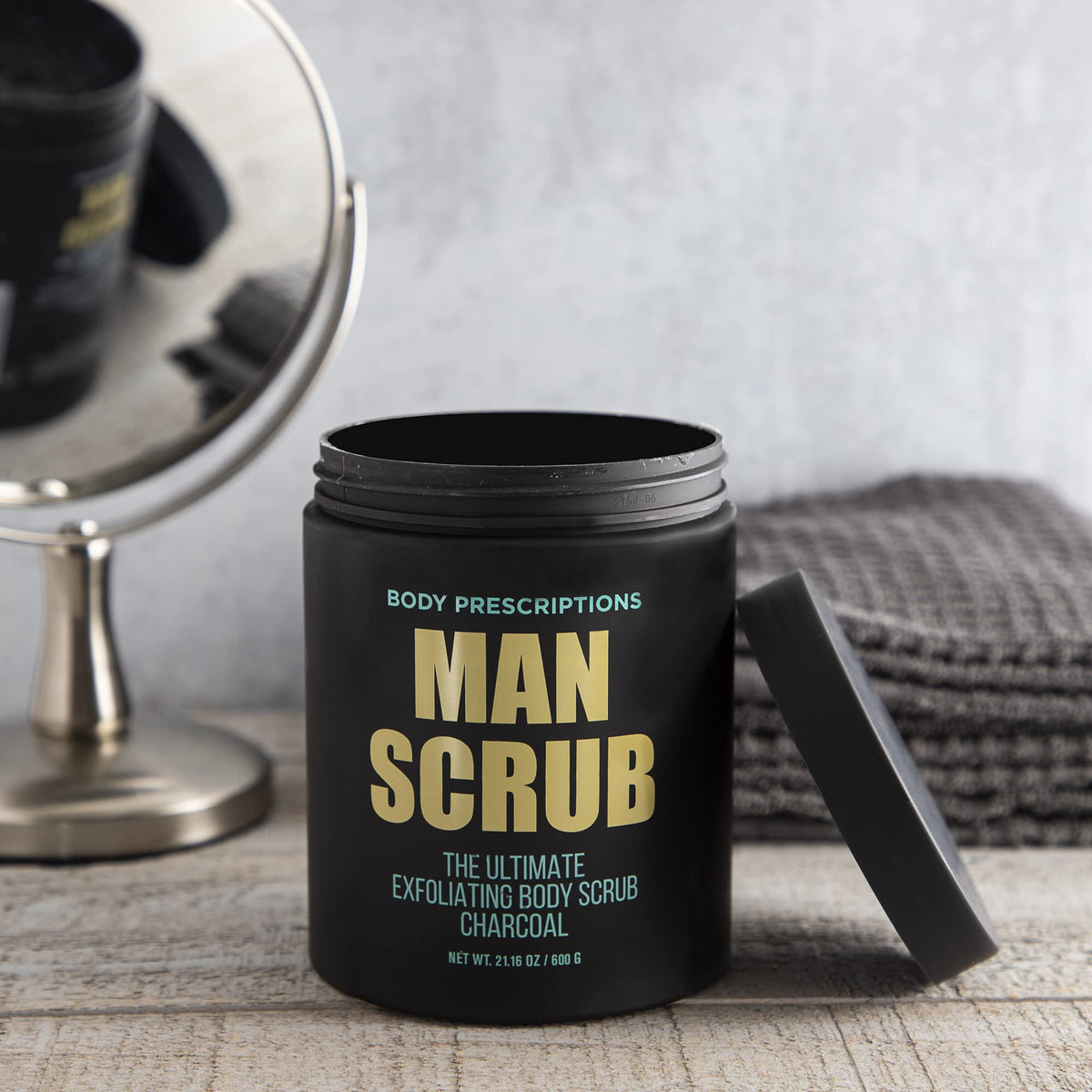 Body Prescriptions jar being used in shower demonstrating easy application