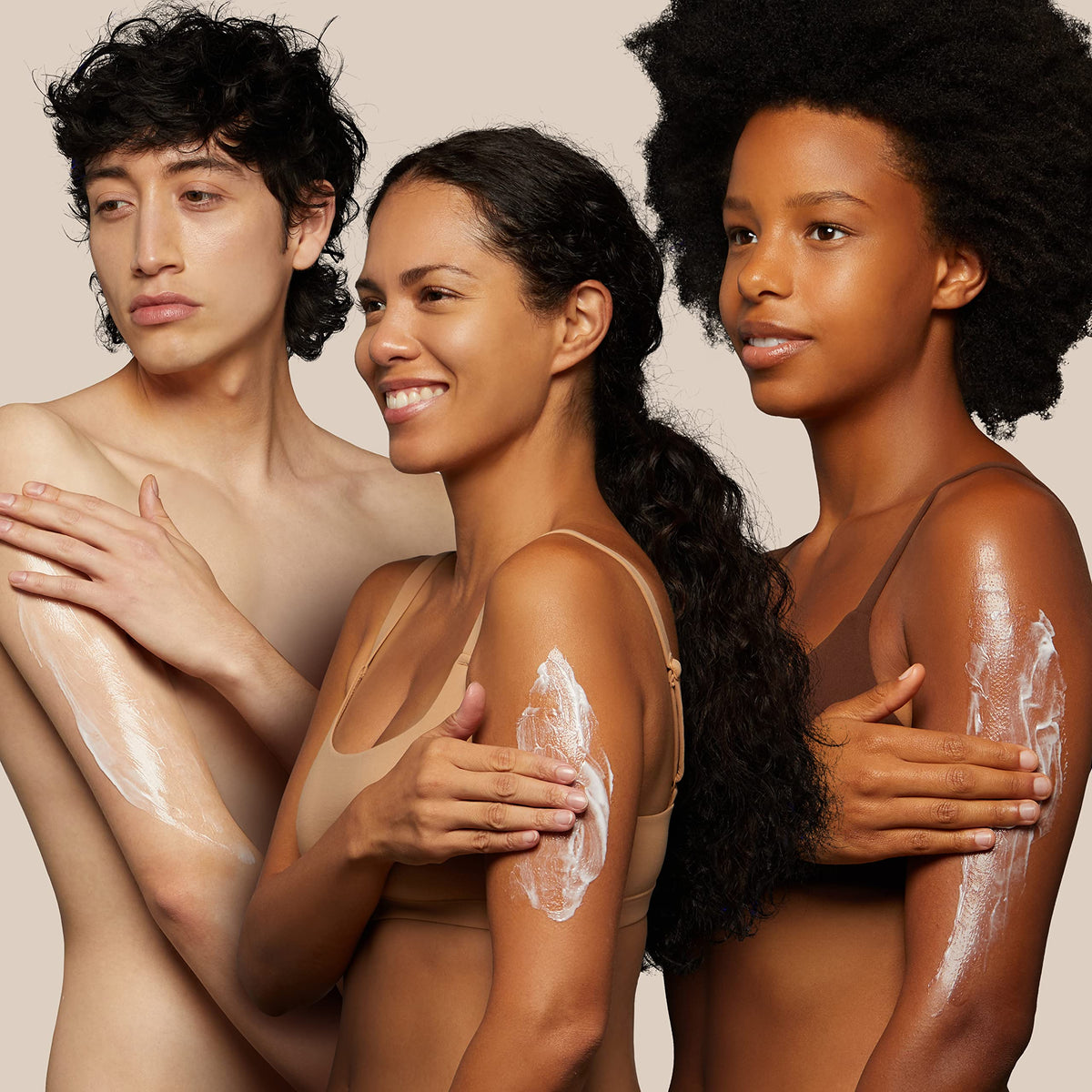 BodyGlide cream on a fingertip close-up, easy spread and long-lasting protection