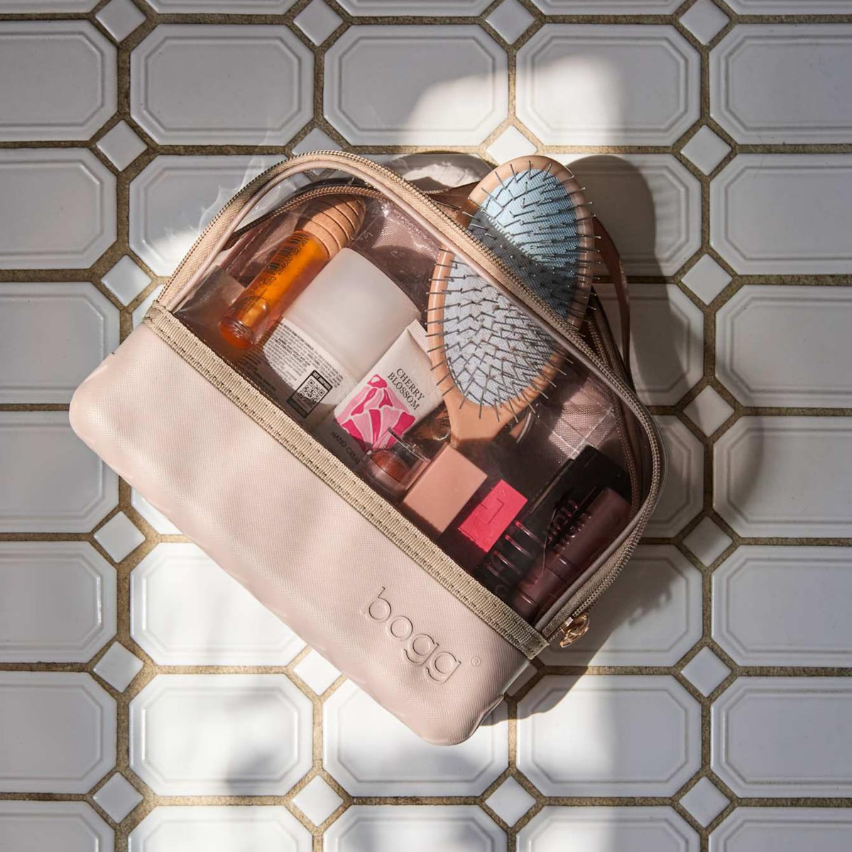 BOGG BAG lifestyle image in a beach tote illustrating washable, travel-ready convenience