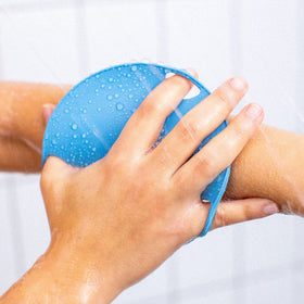 Boie USA stuck to shower wall showing stick-to-wall storage and quick-dry benefit