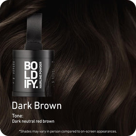 Boldify compact opened to reveal pressed powder and applicator for precise coverage