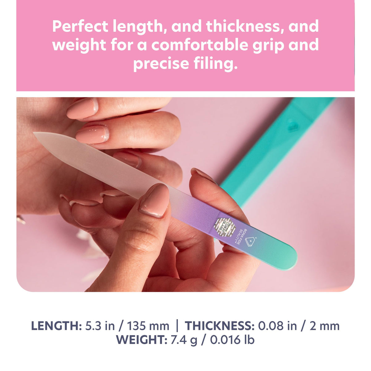 Bona Fide Beauty file next to hand showing length and ergonomic scale