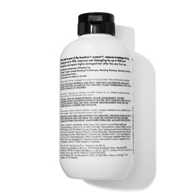 Bondbar bottle next to everyday items showing 8 fl oz scale
