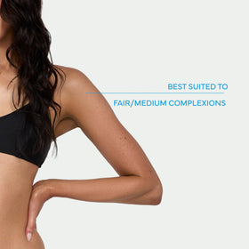 Bondi Sands applying foam with mitt for streak-free, even coverage on skin