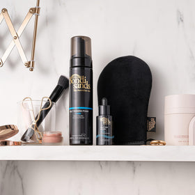 Bondi Sands drops blended into moisturizer demonstrating customizable color control