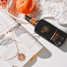 Bondi Sands bottle held in hand to show 150 mL scale and portability benefit