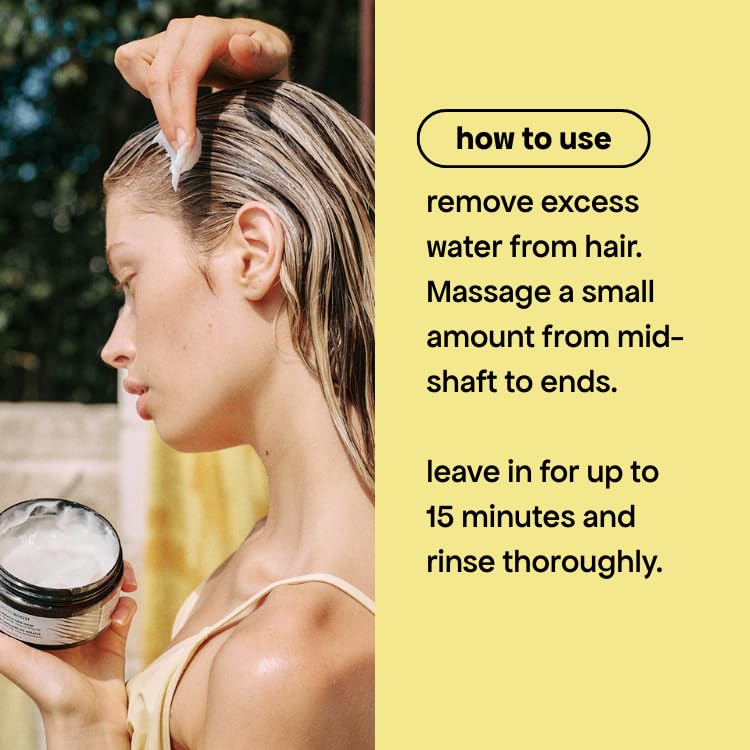 BONDIBOOST jar in hand demonstrating 8.45 fl oz scale