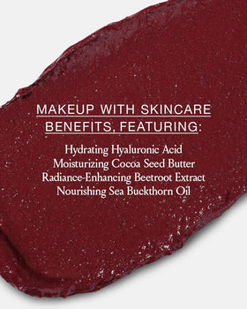 BOOM! by Cindy Joseph lip swatch on hand showing buildable berry tint and moisturizing feel