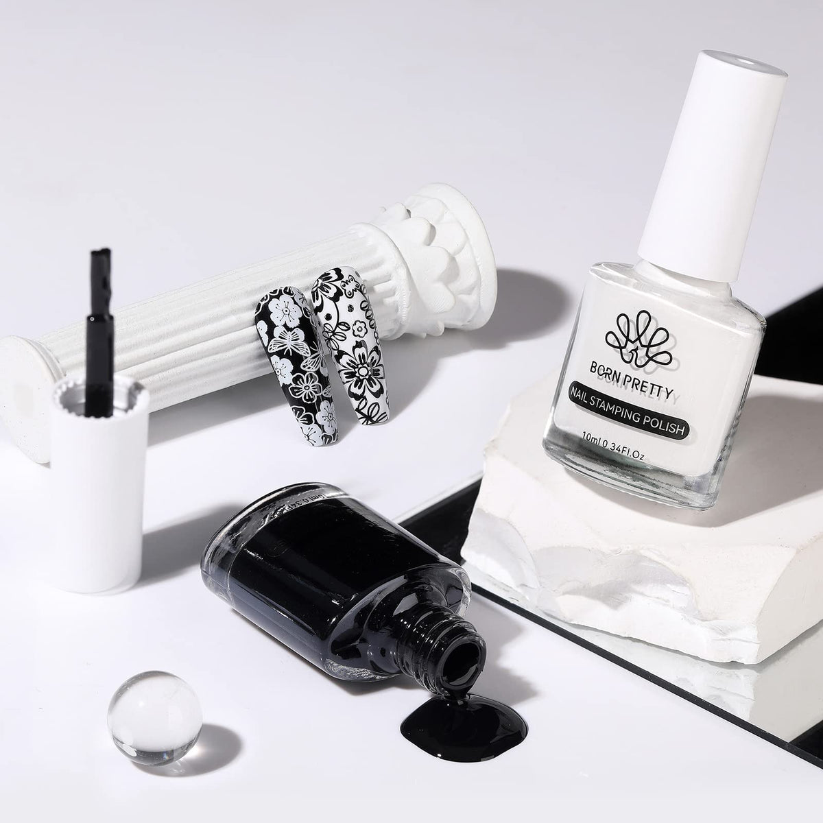 BORN PRETTY bottles beside a coin showing 10ml size and travel-friendly
