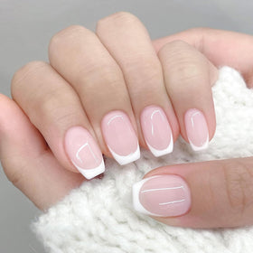 Born Pretty stamper in use pressing a white tip for faster application