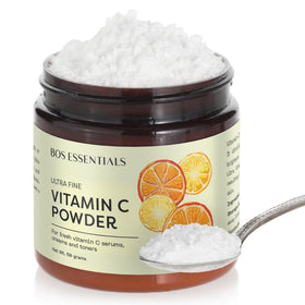 Bos Essentials open jar top view showing fine vitamin C powder for fresh serums