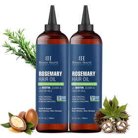 Botanic Hearth bottle next to rosemary and jojoba ingredients emphasizing natural blend