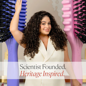 Bounce Curl brush on a bathroom counter in a lifestyle scene suggesting everyday styling convenience