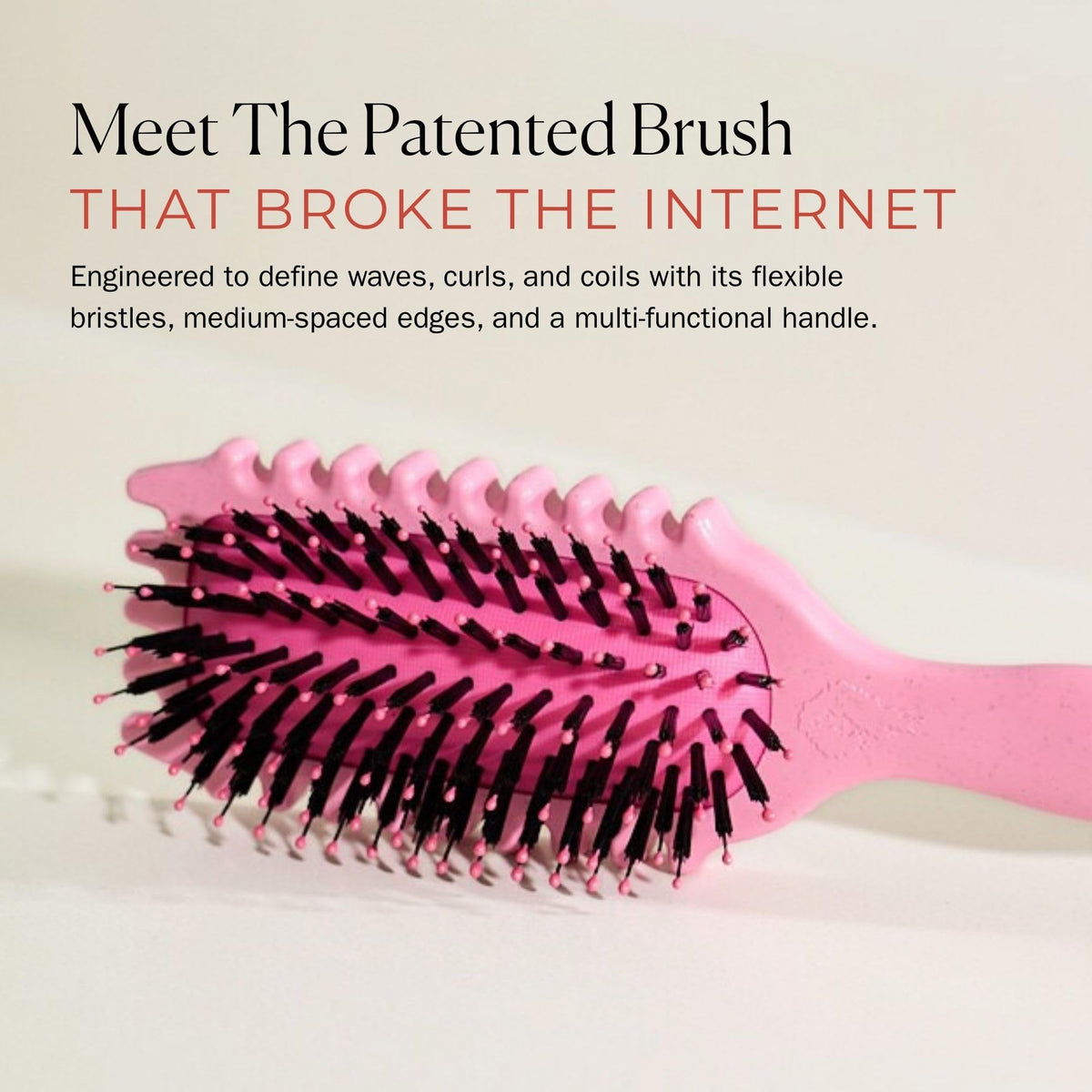 Bounce Curl close-up of vegan boar and round-tipped bristles smoothing strands benefit