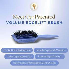 Bounce Curl brush styling damp curls to define clumps and reduce frizz effectively