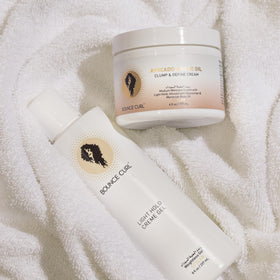 Bounce Curl ingredient shot with aloe and jojoba emphasizing hydration benefits