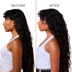 Bounce Curl brush held in hand to show compact size and travel-friendly portability