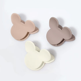 BOUNIQ clips arranged on dresser illustrating everyday accessory convenience