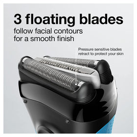 Braun ergonomic grip held in hand showing rubber dot pattern for secure wet handling