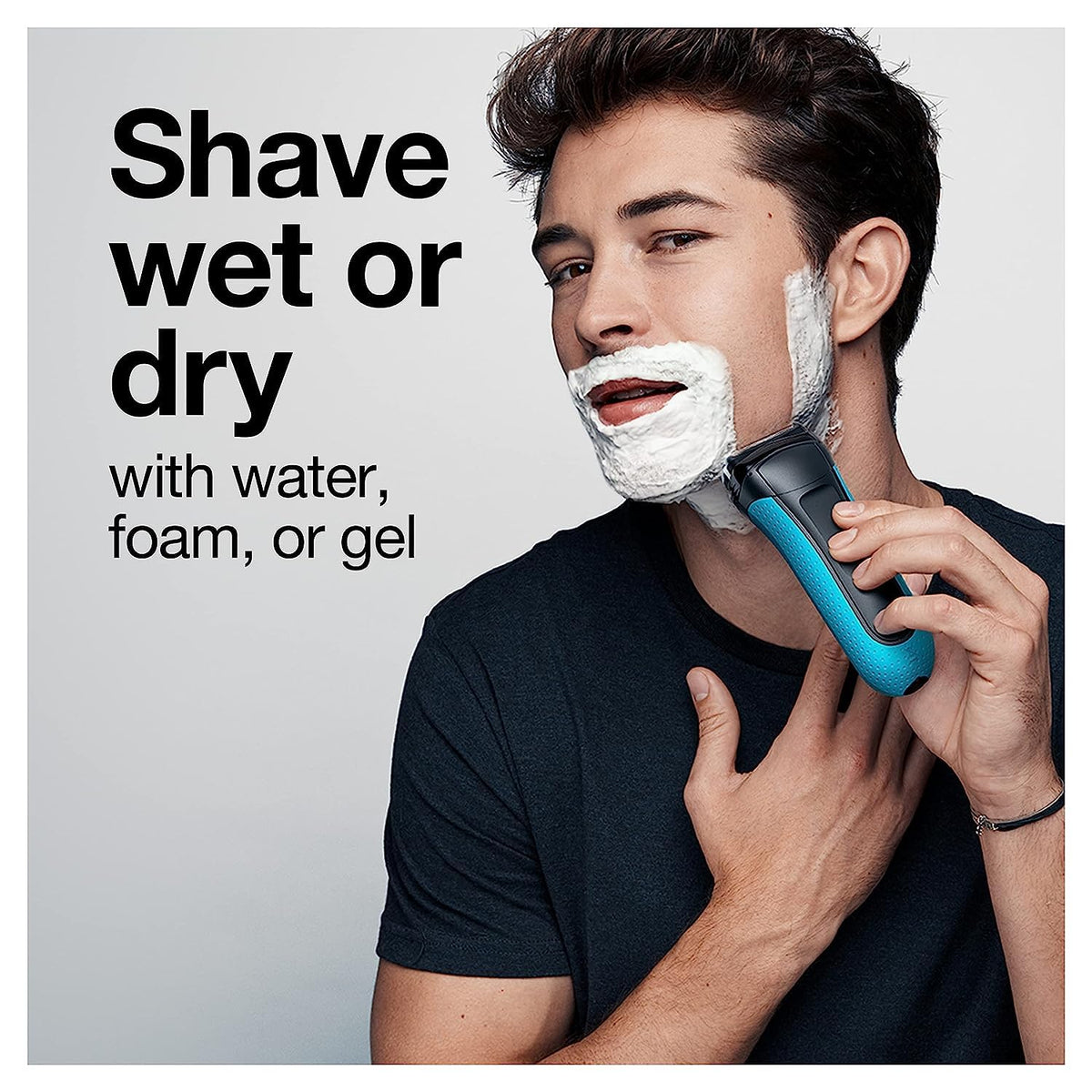 Braun shaver used in shower with foam illustrating comfortable wet shaving option