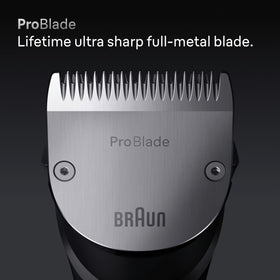 Braun trimmer held in hand to show size and comfortable grip for control