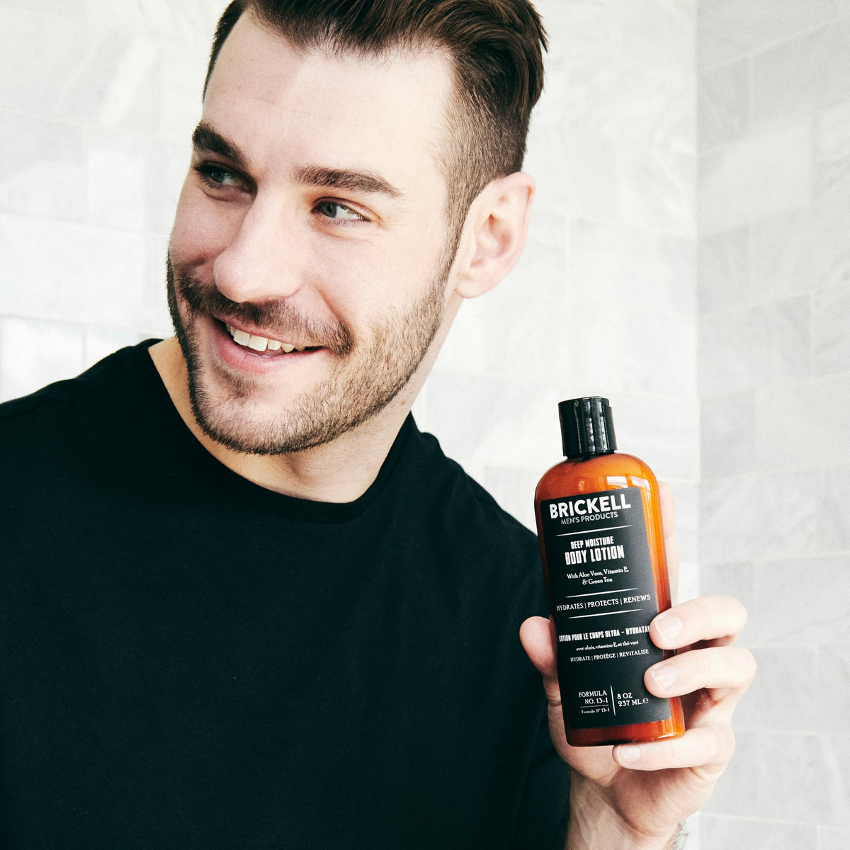 Brickell Men's Products bottle label with ingredients list highlighting aloe and jojoba benefits