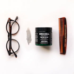 Brickell mask placed on bathroom counter suggesting a simple grooming routine