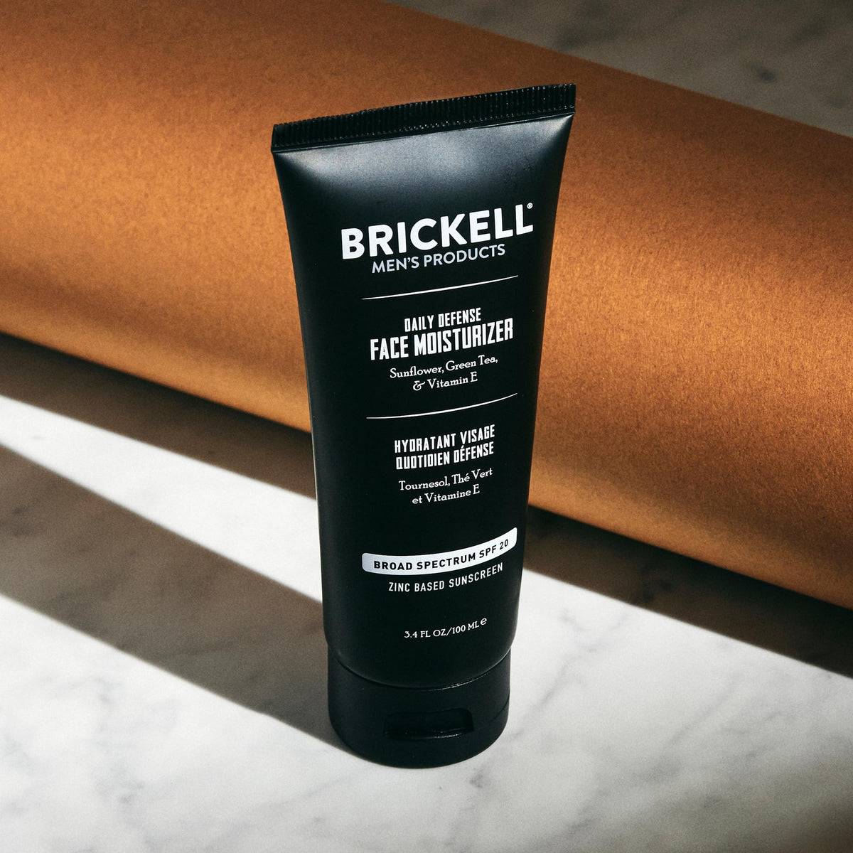 Brickell Men's Products small dollop on hand illustrating spreadability and quick set benefit