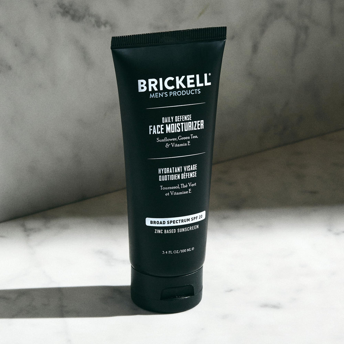 Brickell Men's Products ingredient label highlighting zinc, green tea, and vitamin E benefits