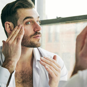 Brickell Men's Products bottle staged on sink showing daily routine convenience benefit