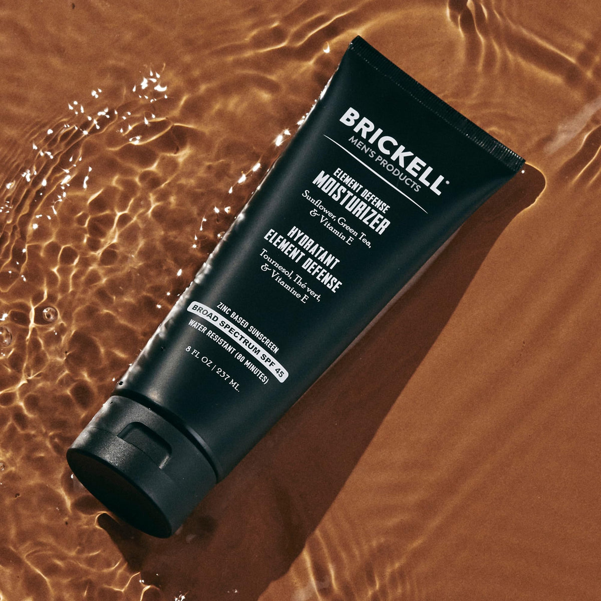 Brickell Men’s 8 ounce tube next to hand for size and portion clarity benefit
