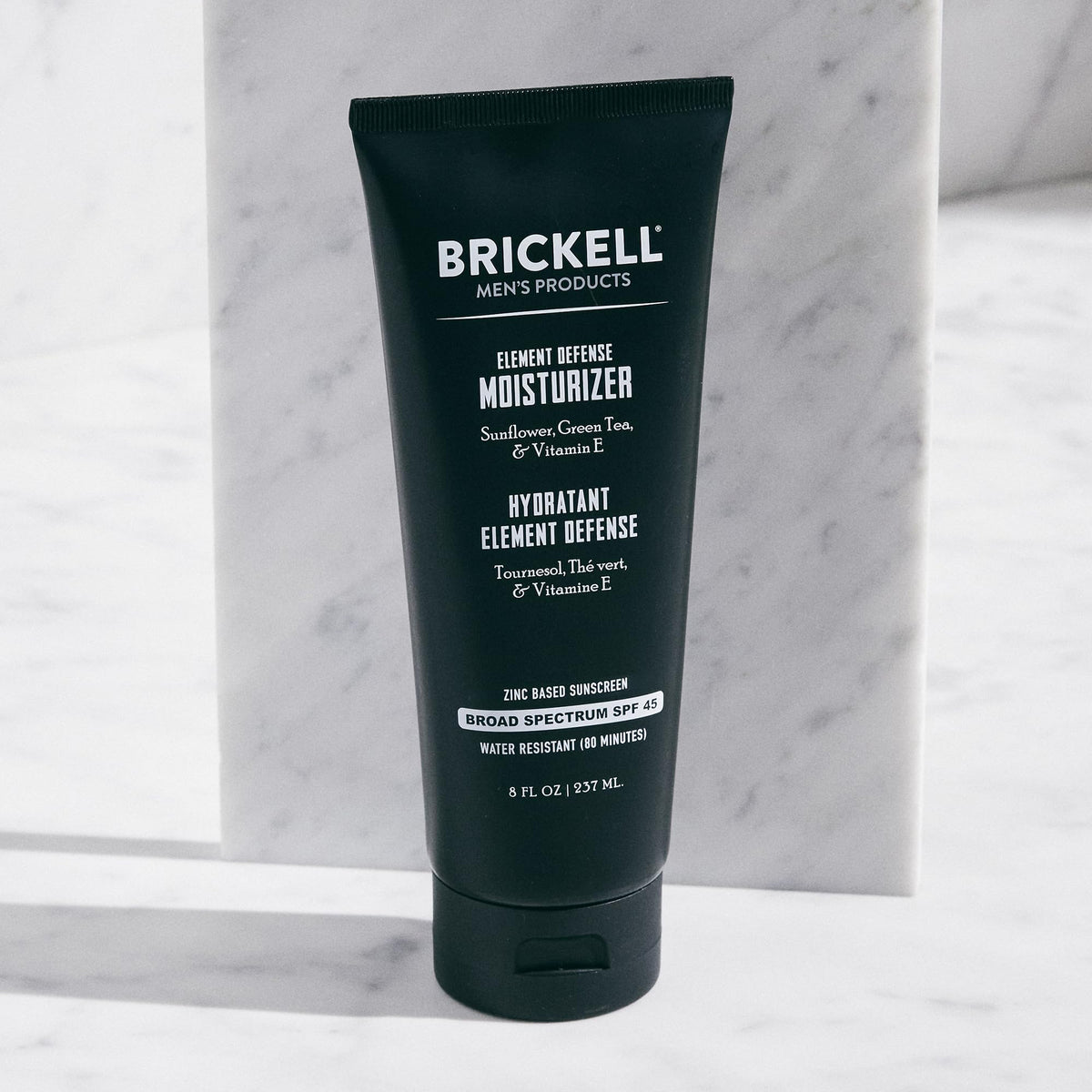 Brickell Men’s close-up of creamy texture demonstrating fast absorption benefit