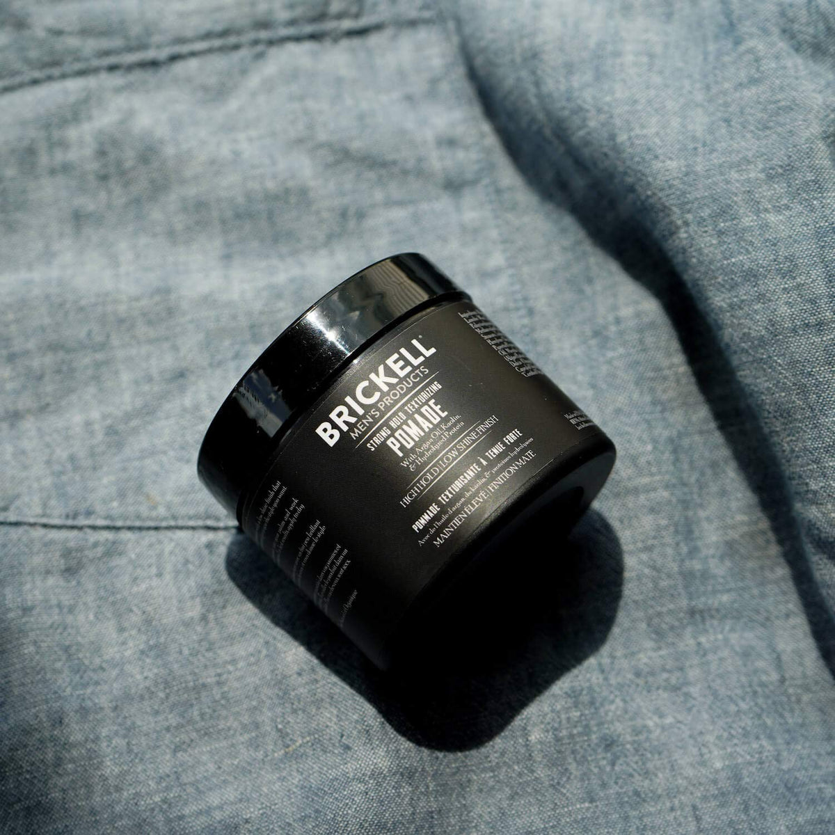 Brickell Men’s Products open jar texture shot showing creamy fiber pomade ready to apply