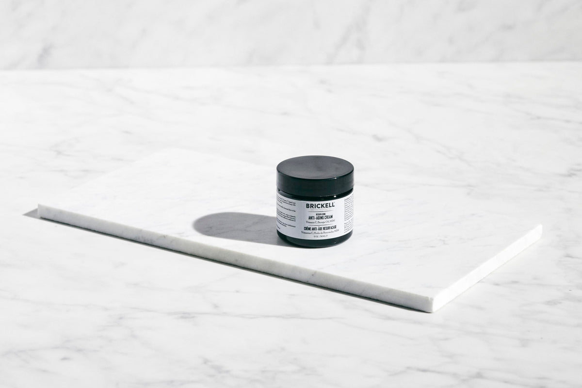 Brickell Men's Products cream being dispensed, convenient controlled amount