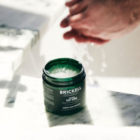 Brickell scrub texture close-up displaying exfoliant particles for smooth skin