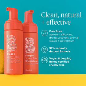 Briogeo foam inside a travel bag among styling tools to show convenience for on-the-go use