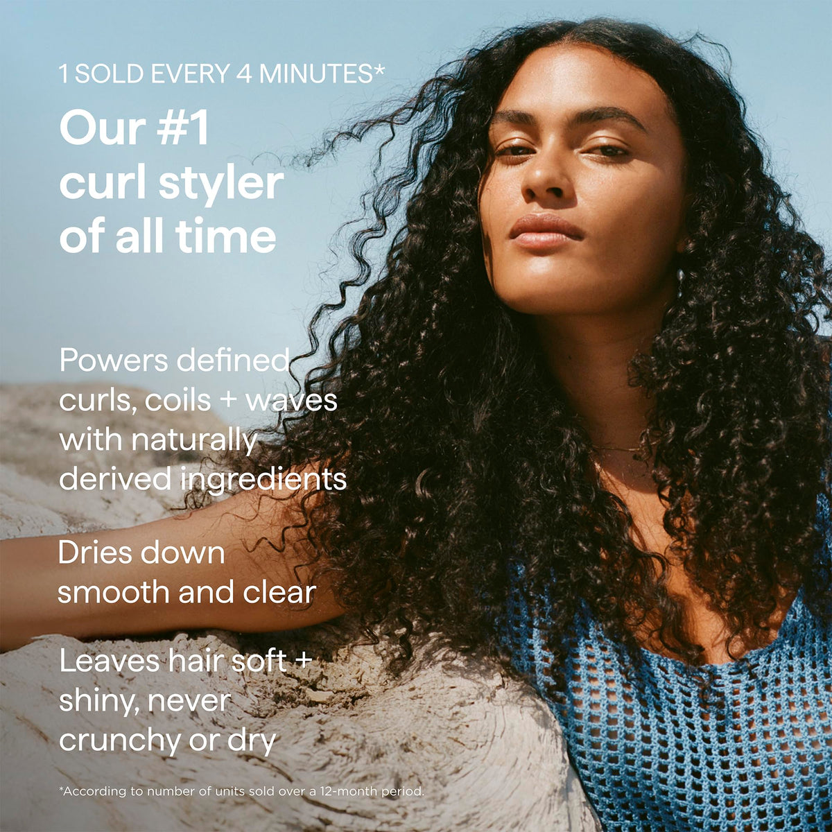 Briogeo model applying cream to curls for enhanced shape and softness