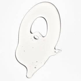 Briogeo shampoo dispensed into hand, foamy texture for mild yet effective clean